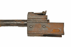 KK-MPi-69 BARREL TRUNNION WITH REAR SIGHT LEAF ASSEMBLY. FRONT PORTION OF THE RECEIVER AND A PORTION OF THE BARREL ARE STILL ON.
SOME RUST ON IT THAT CAN EASILY BE CLEANED.